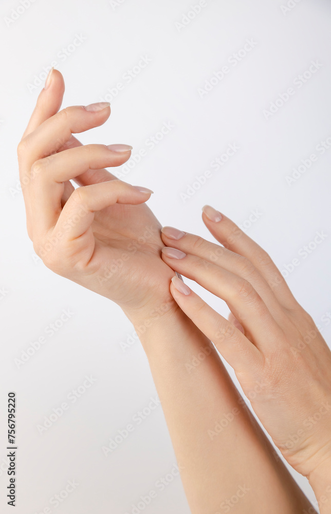 Women's hands on a white background. Two female hands. The concept of hands.