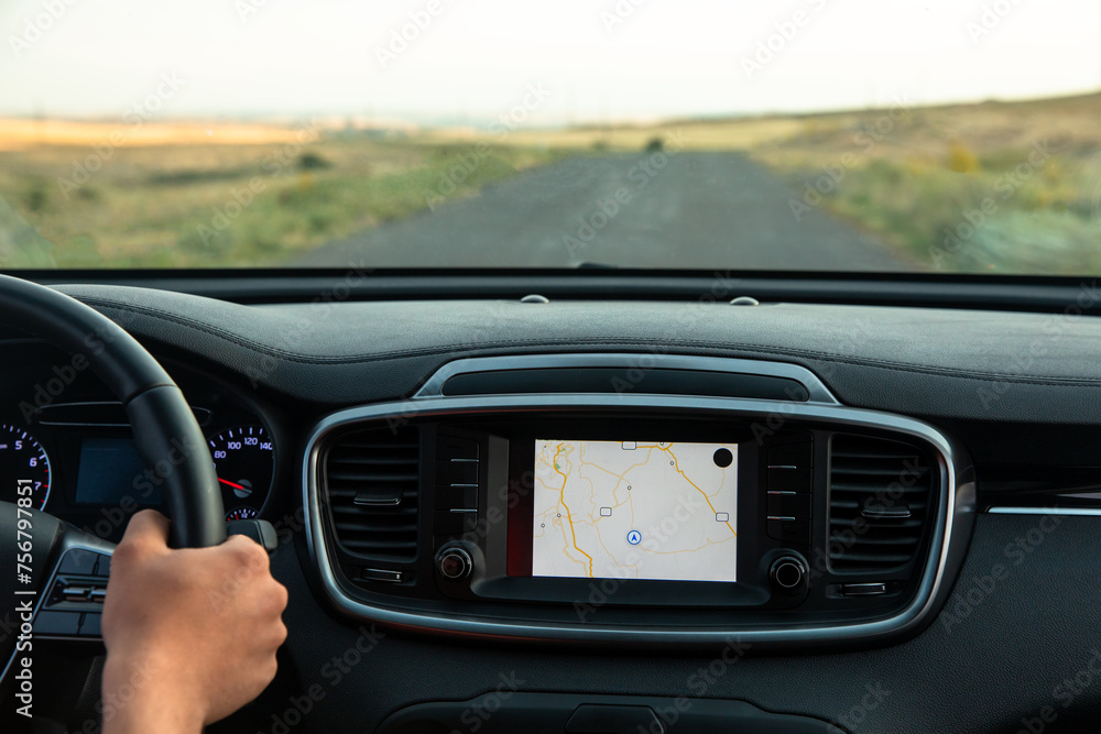 The driver follows the directions of the navigator, photo from inside the car, stock photo