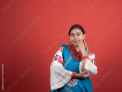 latin girl of kichwa origin happy with a red background