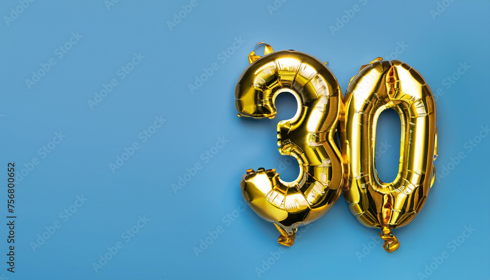 Banner with number 30 golden balloon with copy space. thirty years anniversary celebration concept on a blue background. Banner with number 30 golden balloon with copy space. thirty years anniversary celebration concept on a blue background.