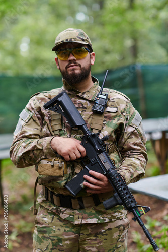  Elite soldier exudes focused determination and readiness, geared up for a perilous military operation, capturing the essence of courage and professionalism in the face of imminent danger