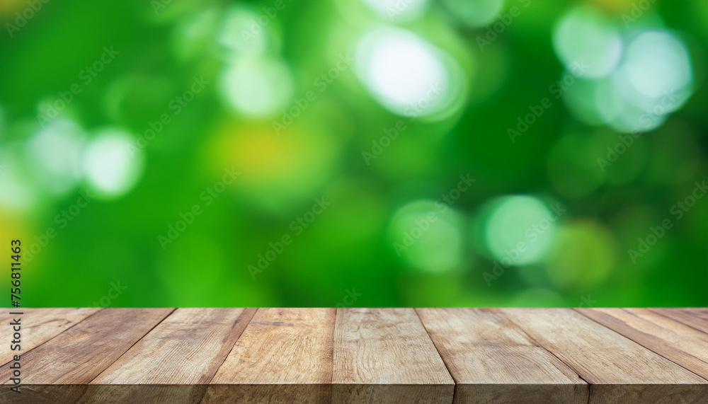Blurred abstract green bokeh and wooden table background., for montage product display design Blurred abstract green bokeh and wooden table background., for montage product display design