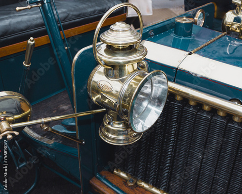 brass lamp headlight on a vintage car