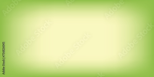 A green blurry background with a soft yellow color border. 