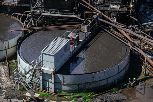 Round flotation basin at ore dressing plant, aerial view