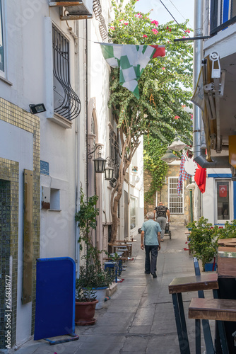 Man walking down a typical street