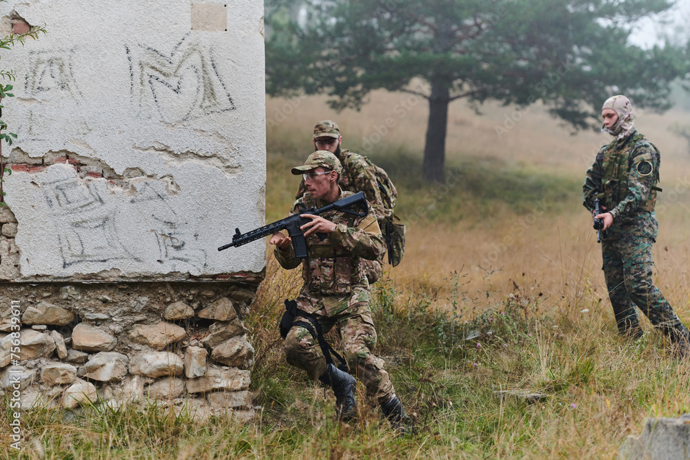 Fototapeta premium In a high stakes mission, a specialized military unit executes a tactical operation to secure a dangerous house where terrorists are believed to be hiding, showcasing precision and coordinated