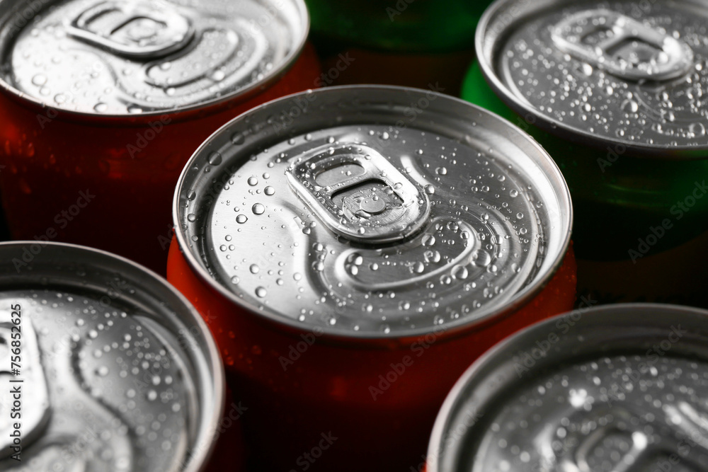 Energy drink in wet cans, closeup. Functional beverage Energy drink in wet cans, closeup. Functional beverage