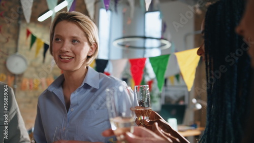 Business team toasting glasses celebrating corporate victory in office close up.