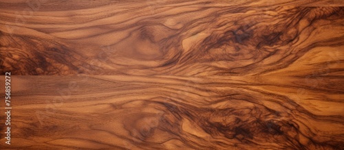 Luxurious nut veneer texture for a chic desktop. High-quality image.