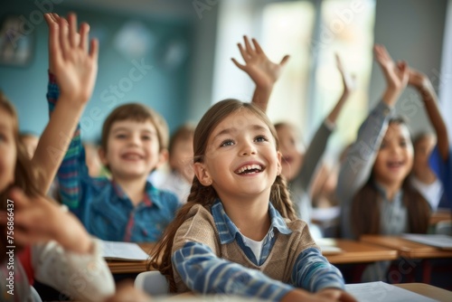 A group of children are sitting in a classroom and one girl is smiling