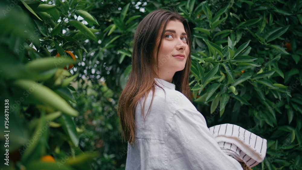 Gentle girl walking botanic garden closeup. Brunette lady looking camera alley Gentle girl walking botanic garden closeup. Brunette lady looking camera alley