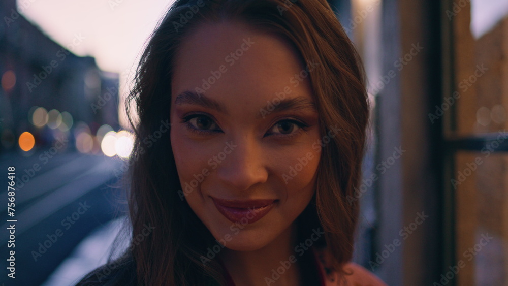 Gorgeous model posing dark street looking camera close up. Happy girl tourist Gorgeous model posing dark street looking camera close up. Happy girl tourist