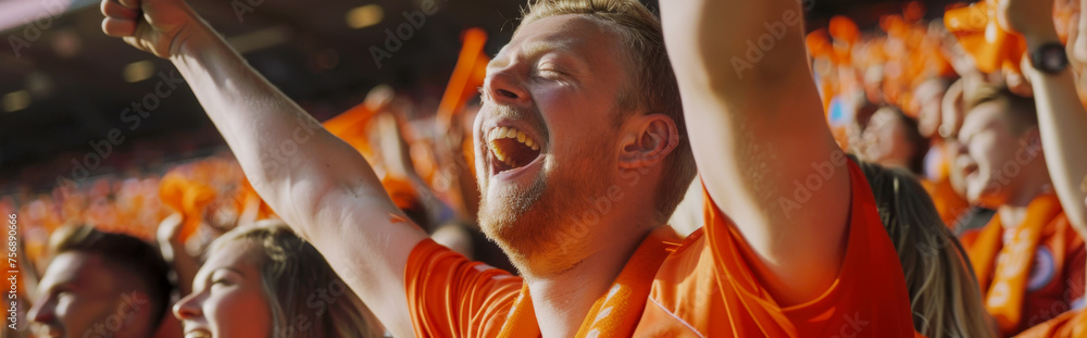 Dutch football soccer fans in a stadium supporting the national team, Oranje 
 - obrazy, fototapety, plakaty 