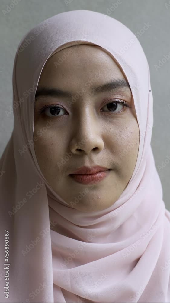 A captivating close-up of an Asian Muslim woman, highlighting the depth and soulfulness in his eye, creating a compelling and intimate portrait A captivating close-up of an Asian Muslim woman, highlighting the depth and soulfulness in his eye, creating a compelling and intimate portrait