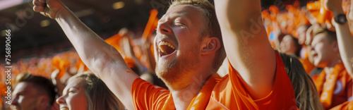 Dutch football soccer fans in a stadium supporting the national team, Oranje 