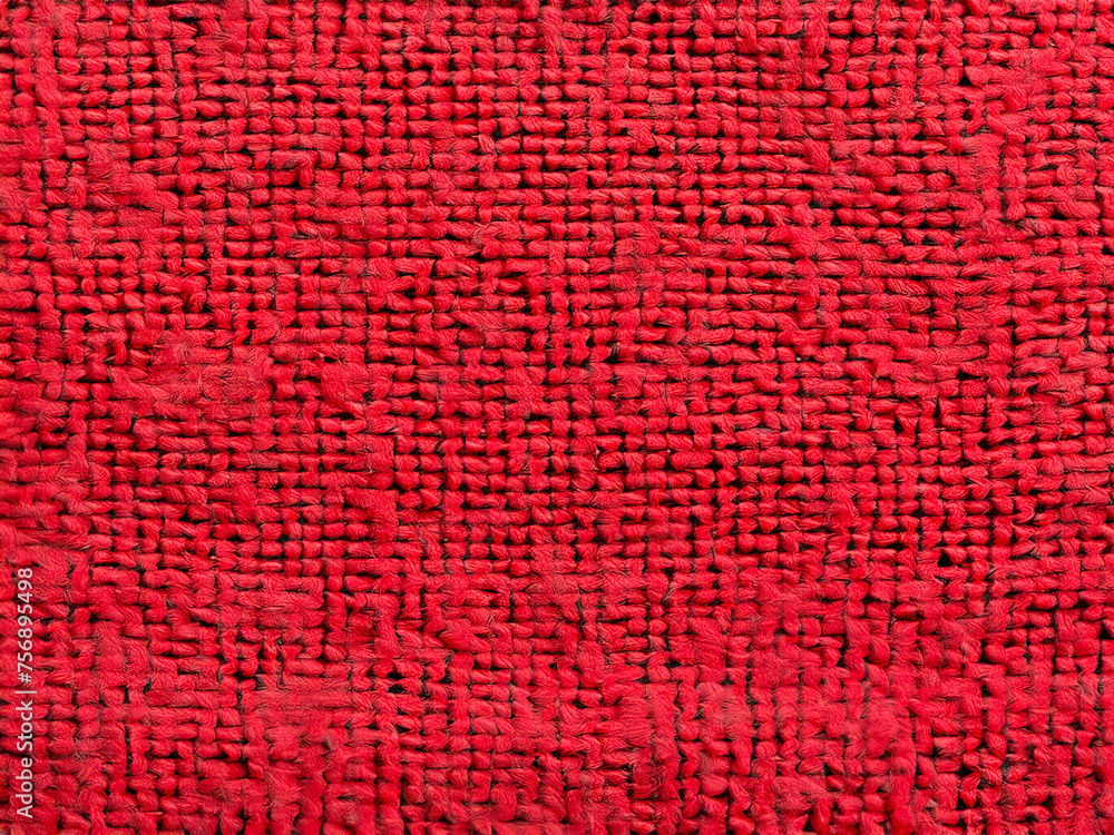 close up of red textile background close up of red textile background