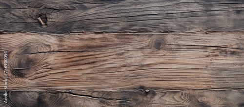Weathered wooden surface with an aged appearance and pattern of wood fibers