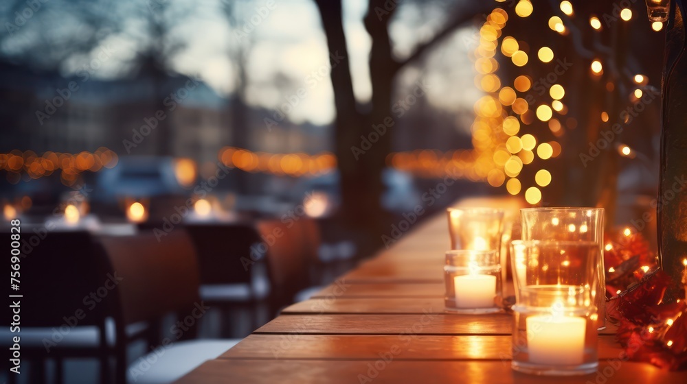 Background in billboard design, outdoor table of restaurant in winter. Cozy atmosphere, focused focus, bokeh. Background in billboard design, outdoor table of restaurant in winter. Cozy atmosphere, focused focus, bokeh.