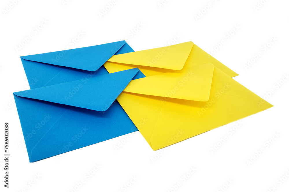 Blue and yellow paper envelopes arranged overt white Blue and yellow paper envelopes arranged overt white