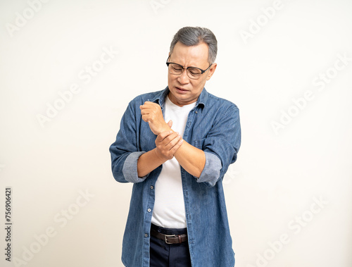 Old man senior have skin problems he felt irritation on his skin. Skin infection itching red rash scratching with hands. Unwell unhealthy Mature man standing on isolated background
