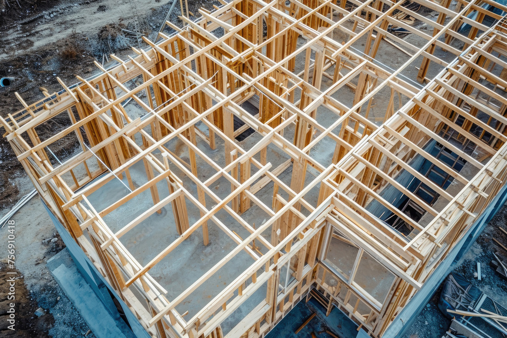 Aerial view of construction of a framework of a new wooden house