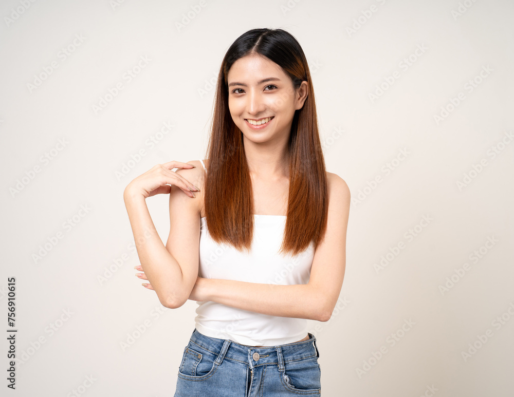 Obraz premium Beautiful smiling happy young asian woman age around 25. Charming female lady standing pose on isolated white background. Asian attractive woman people looking camera confident with backdrop.