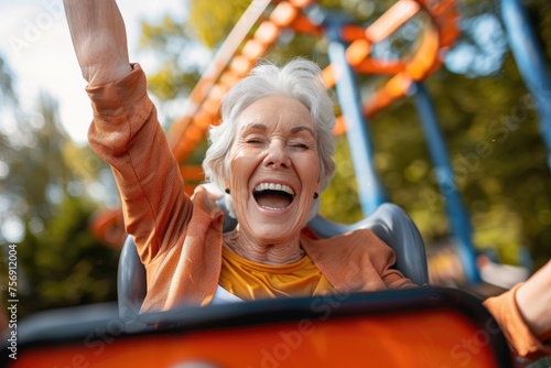 Happy senior woman having fun at the roller coaster