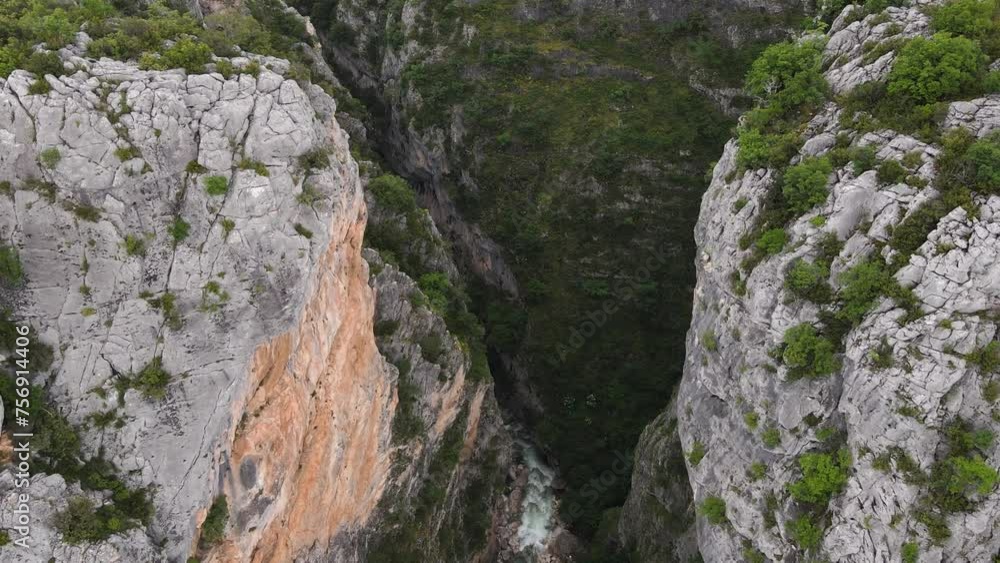 Bird's-eye view of canyon of Portitsa , revealing its natural beauty and peaceful surroundings. Bird's-eye view of canyon of Portitsa , revealing its natural beauty and peaceful surroundings.