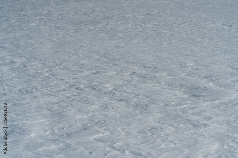 Snow texture above meadow after windy conditions. Snow texture above meadow after windy conditions.