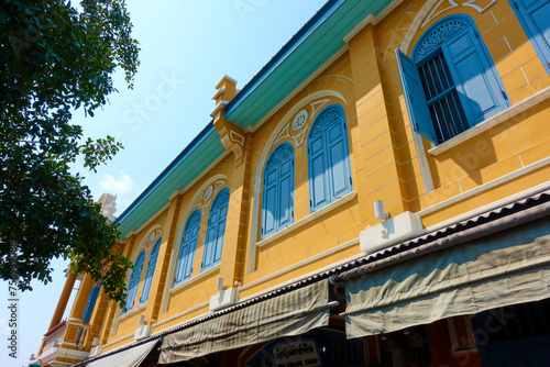 Brightly colored ancient buildings in colonial style in Bangkok  Thailand.