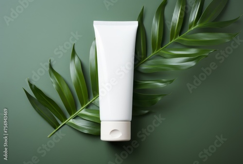 Wallpaper Mural A tube of baby lotion sits next to a green leaf, its minimalist features and monochromatic white figures apparent. Torontodigital.ca