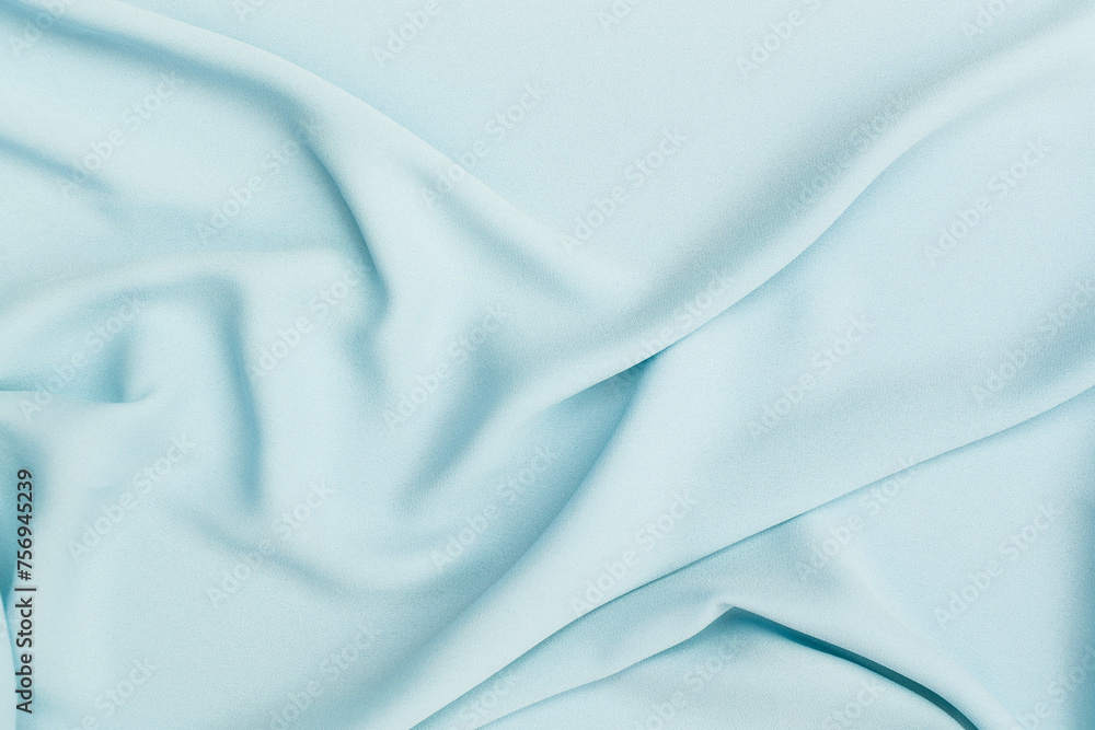 Closeup waving blue fabric background, blank blue fabric texture background