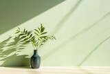 Minimalistic green plant shadow play on a clean wall, embodying tranquility and growth.