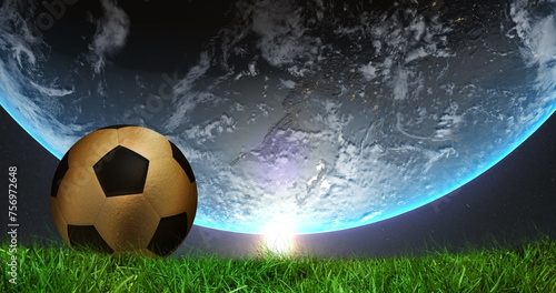 Image of spinning globe over football ball on grass photo