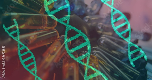 Image of rotating DNA strands over colorful spinning test tubes