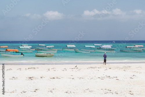 Nungwi Beach and boats on the Indian Ocean waiting for tourists, Zanzibar near Jambiani