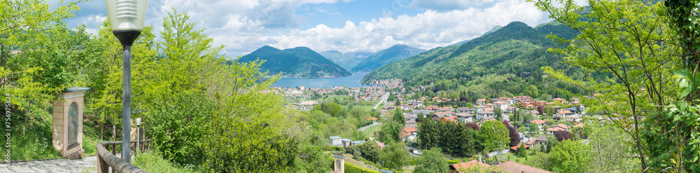 Lugano lake and the towns of Besano and Porto Ceresio. In the background Vico Morcote and Campione d'Italia towns. Besano is the starting point for the Italian side of Mount San Giorgio, UNESCO Site