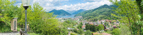 Lugano lake and the towns of Besano and Porto Ceresio. In the background Vico Morcote and Campione d Italia towns. Besano is the starting point for the Italian side of Mount San Giorgio  UNESCO Site