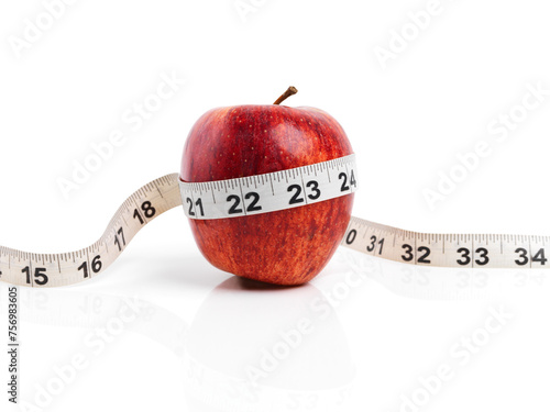 Apple, wellness and tape measure with red fruit in studio isolated on white background for diet, health or nutrition. Sustainability, vitamins and size with organic produce for detox or weightloss