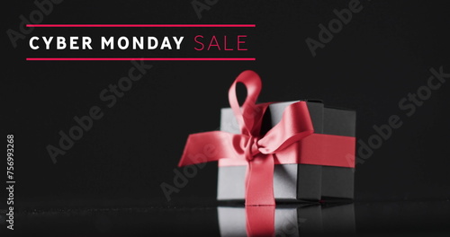 Image of cyber monday sale text over gift box