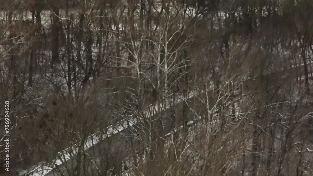 Snowy Day Over Road By The Forest Near Lake Sequoyah In Washington County, Arkansas. Aerial Drone Shot Snowy Day Over Road By The Forest Near Lake Sequoyah In Washington County, Arkansas. Aerial Drone Shot