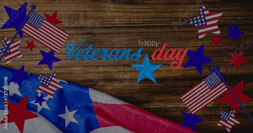 Image of veterans day text over wooden table and american flag