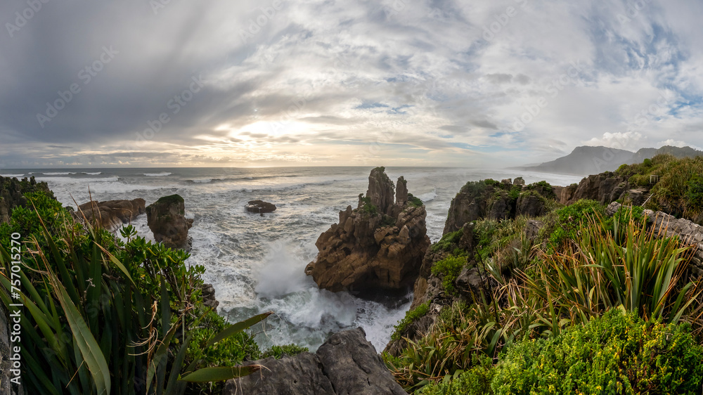 The Pancake Rocks and Blowholes are a coastal rock formation at Punakaiki on the West Coast of the South Island of New Zealand The Pancake Rocks and Blowholes are a coastal rock formation at Punakaiki on the West Coast of the South Island of New Zealand