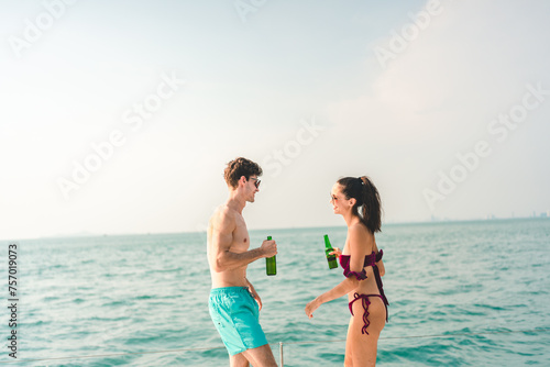 A couple is sitting on a bo...