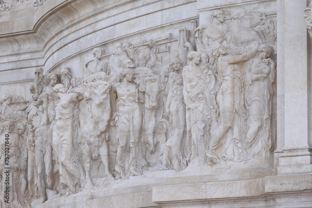 Vittoriano War Memorial Relief Detail Depicting People, Cows an a Horse in Rome, Italy