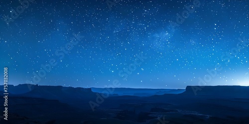 Blue gradient starry night sky above expansive desert landscape. Concept Starry Night Sky, Desert Landscape, Blue Gradient, Nature Photography