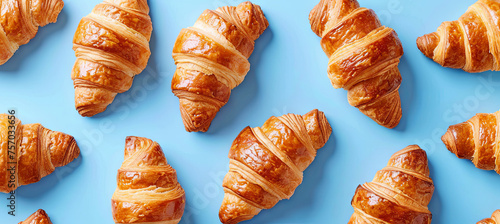 banner of croissants on the blue background