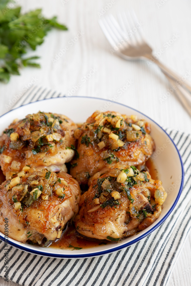 Homemade Garlic Brown Sugar Chicken in a Pan, side view. Close-up. Homemade Garlic Brown Sugar Chicken in a Pan, side view. Close-up.