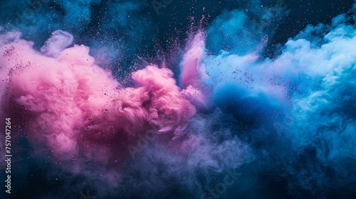 Vibrant pink and blue powder floating in the air.